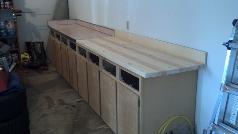 Overhang is intentional and allows for some space to clamp stuff when required.